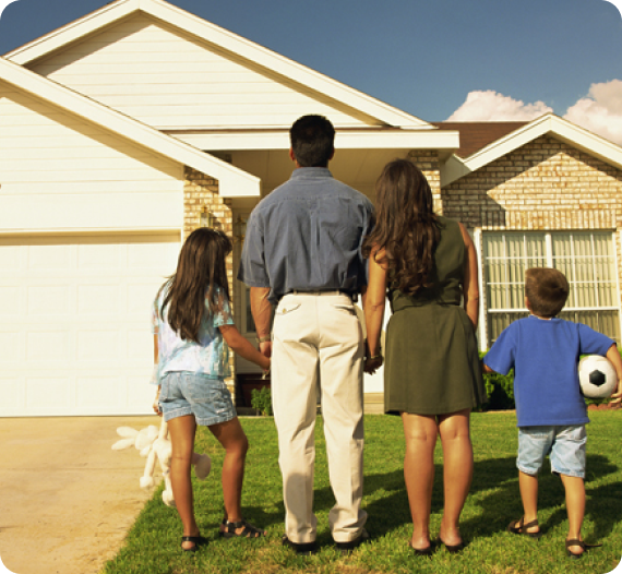 Family looking at a house