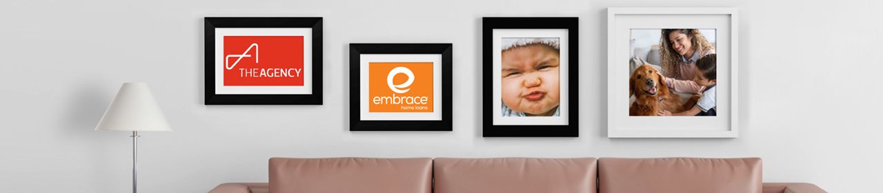 Couch, table lamp, and frames that has embrace logo, a baby, family, and the agency logo